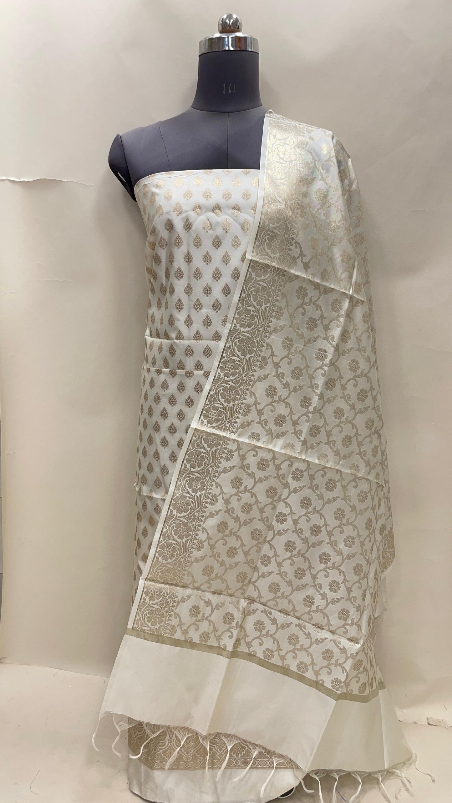 White art silk suit set with floral zari bootis and matching dupatta. SHL_64