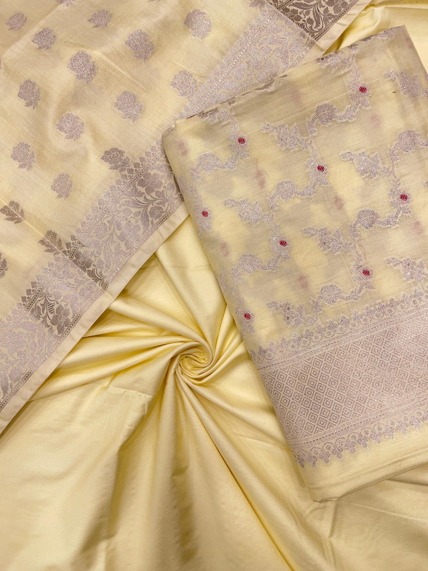 Yellow katan chiniya silk suit set with floral silver zari mina jaal dupatta. SHL_44