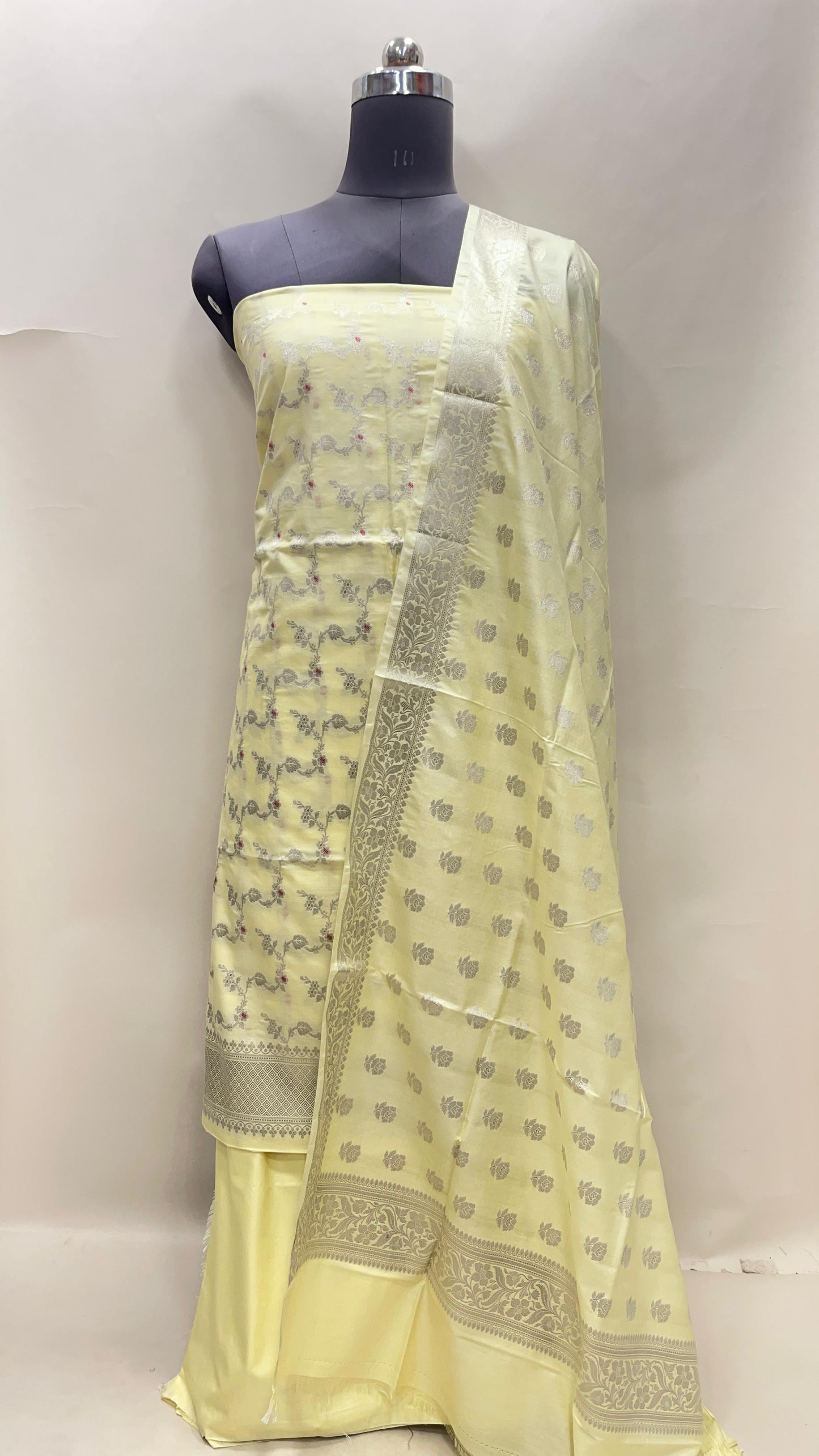 Yellow katan chiniya silk suit set with floral silver zari mina jaal dupatta. SHL_44
