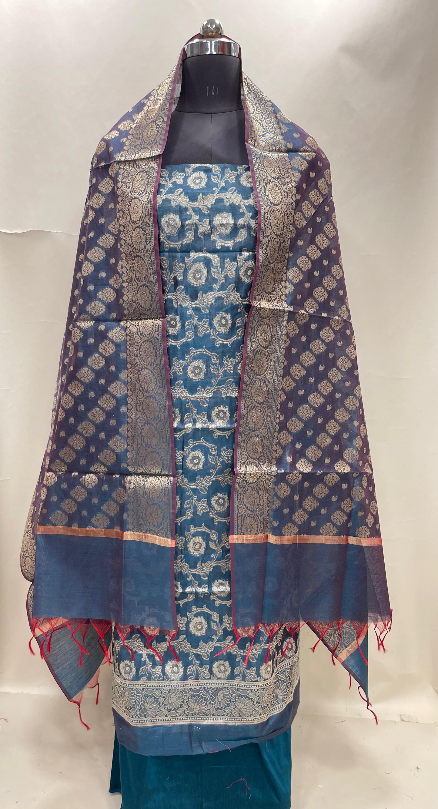 Dark seagreen cotton suit set with zari resham mina jaal and matching dupatta. SHL_31