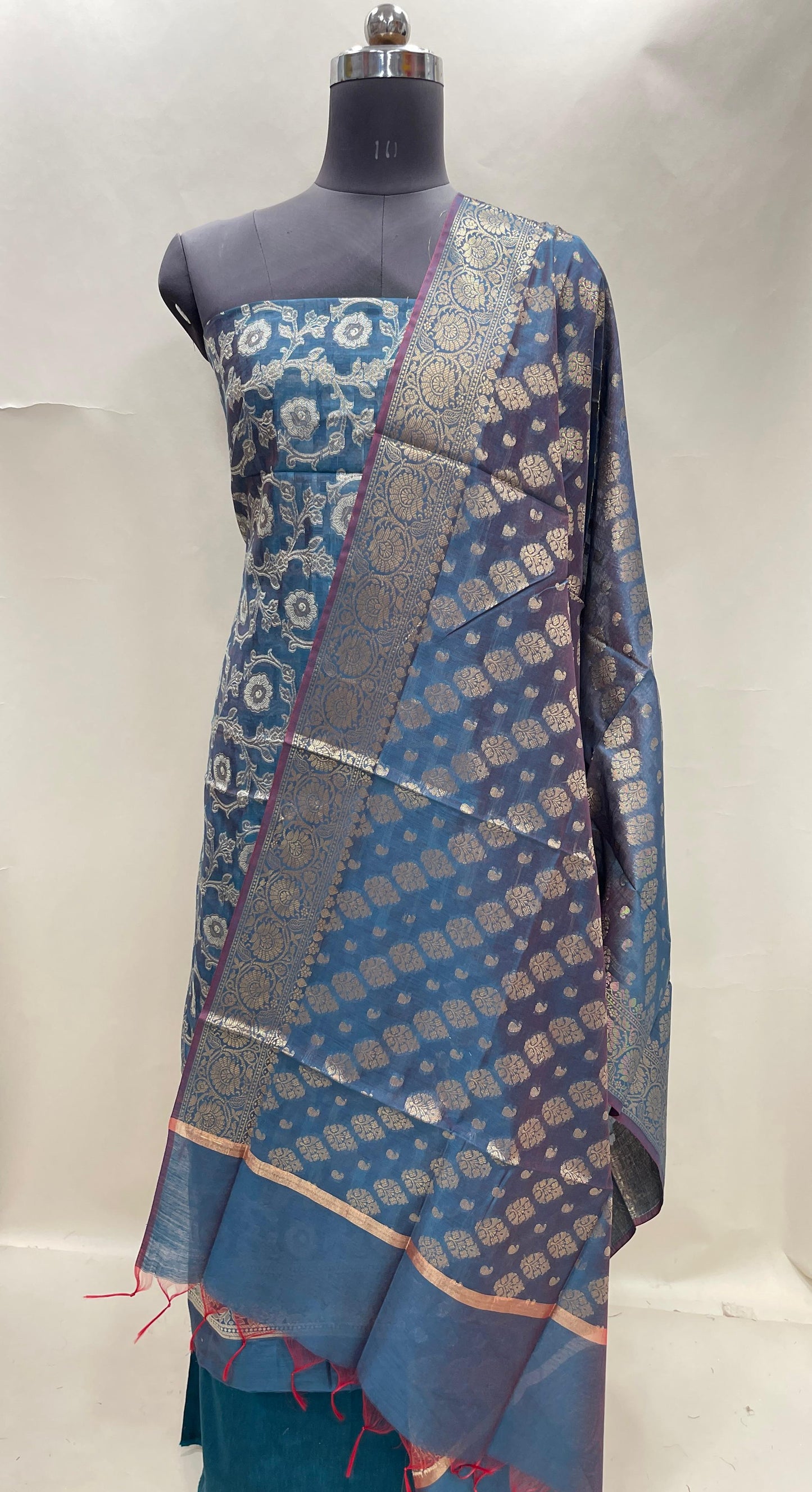 Dark seagreen cotton suit set with zari resham mina jaal and matching dupatta. SHL_31