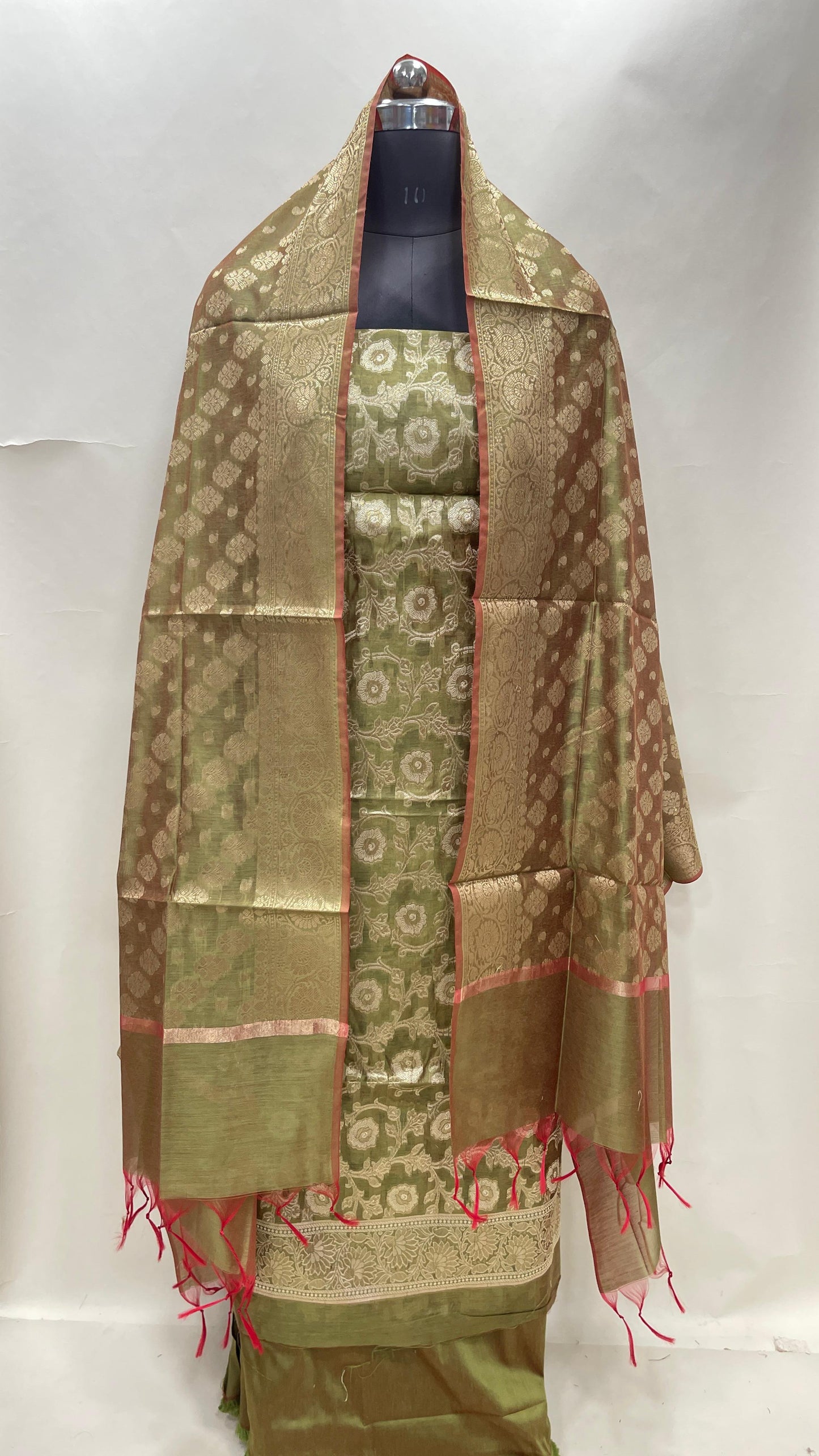 Pistachio green cotton suit set with zari resham mina jaal and matching dupatta. SHL_29