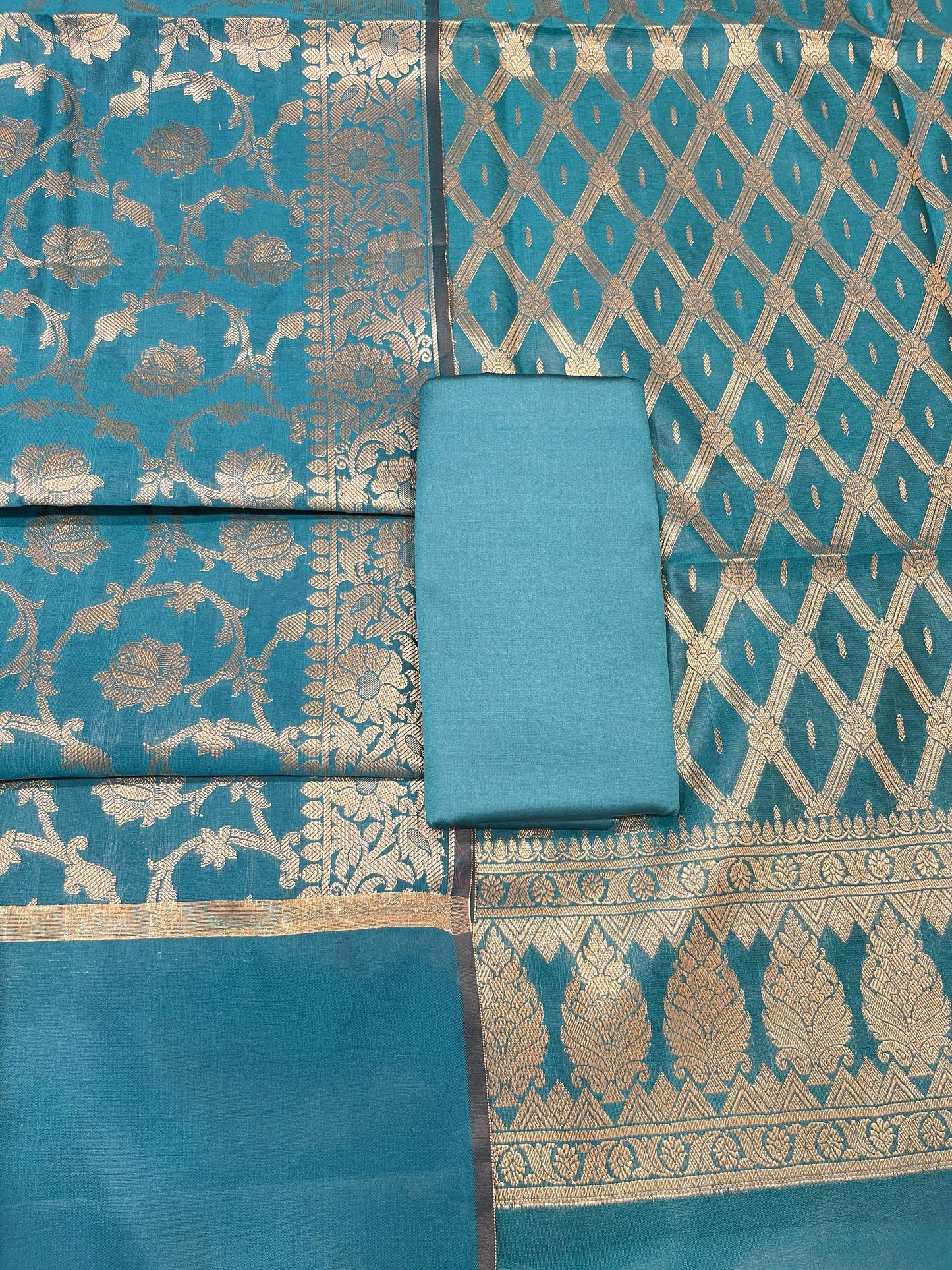Dark seagreen art silk suit set with diagonal zari stripes and matching dupatta. SHL_51