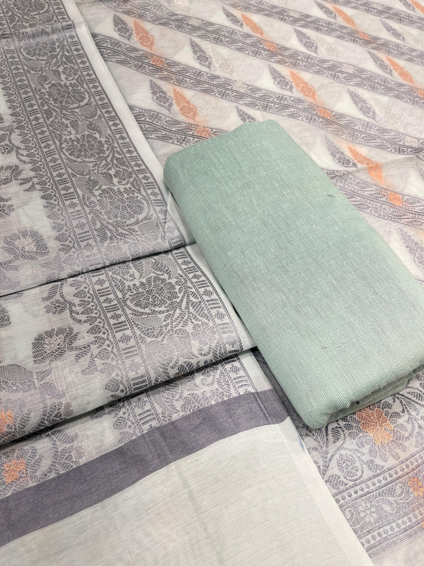Seagreen cotton suit with diagonal resham stripes and tilfi jaal dupatta. SHL_16