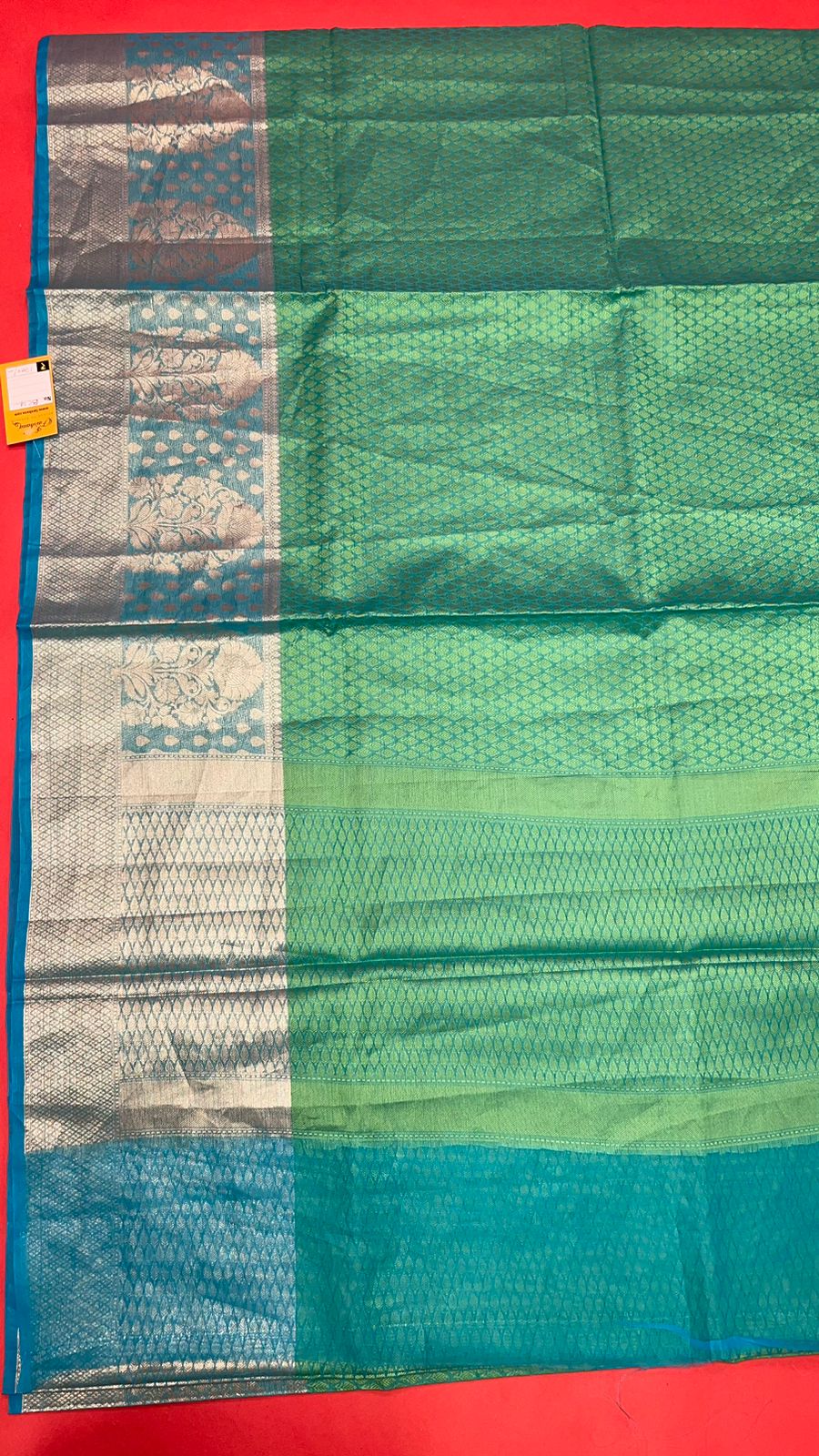 Faishana Green Resham Brocade Saree With Contrast Turquoise Blue Zari Pattu Border