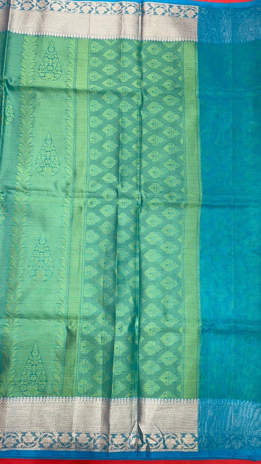 Faishana Green Resham Brocade Saree With Contrast Turquoise Blue Zari Pattu Border