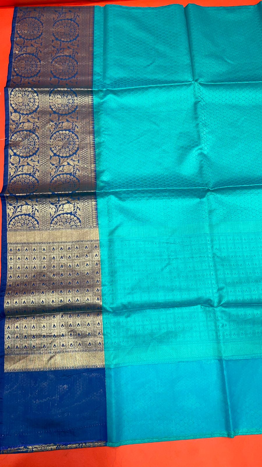 Faishana Turquoise Blue Resham Brocade Saree With Contrast Blue Zari Pattu Border