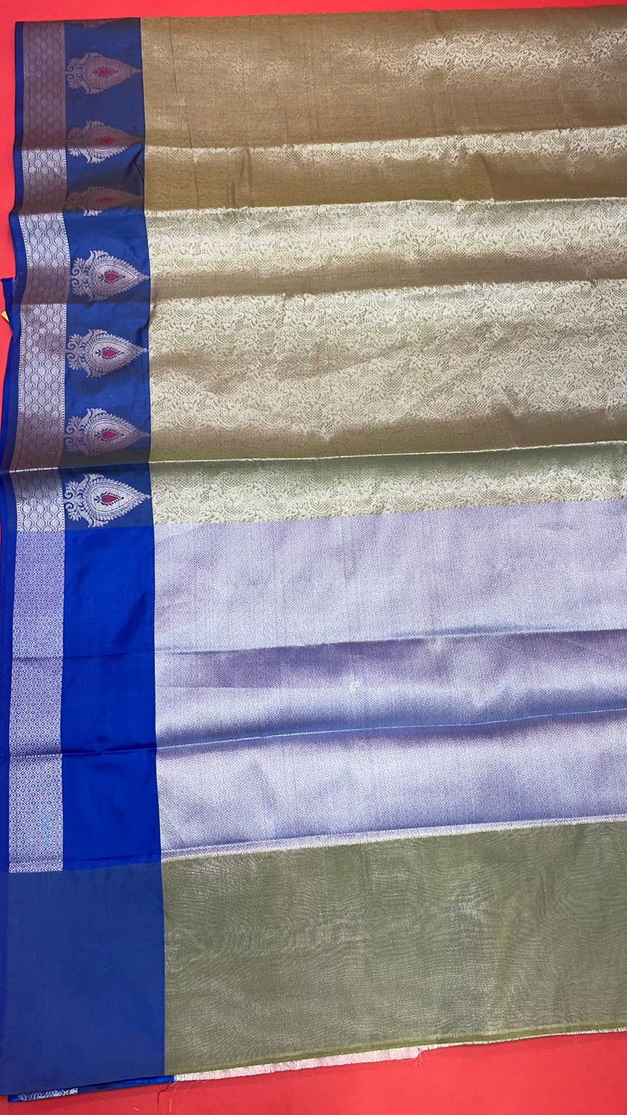 Faishana Presents Green Silver Zari Kanchi Silk Tanchoi Brocade Contrast Blue Skirt Meena Border Banarasi Saree