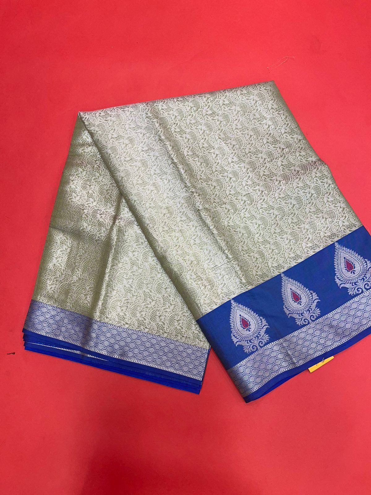 Faishana Presents Green Silver Zari Kanchi Silk Tanchoi Brocade Contrast Blue Skirt Meena Border Banarasi Saree