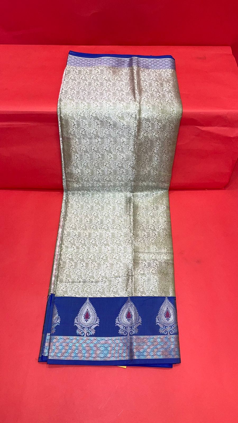 Faishana Presents Green Silver Zari Kanchi Silk Tanchoi Brocade Contrast Blue Skirt Meena Border Banarasi Saree