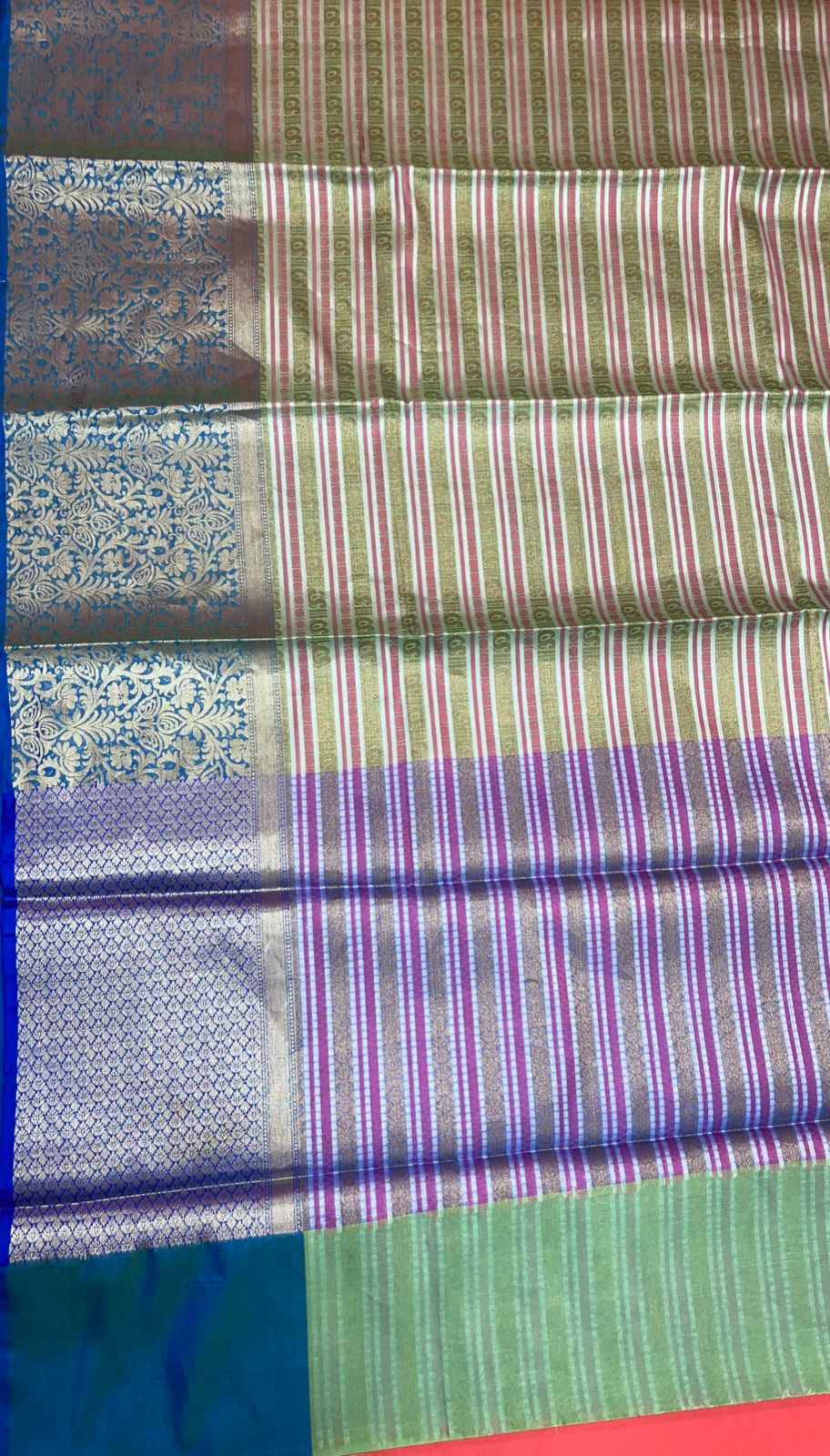 Faishana Presents Green Zari Strip Kanchi Silk Tanchoi Brocade Contrast Torqouise Blue Skirt Border Banarasi Saree
