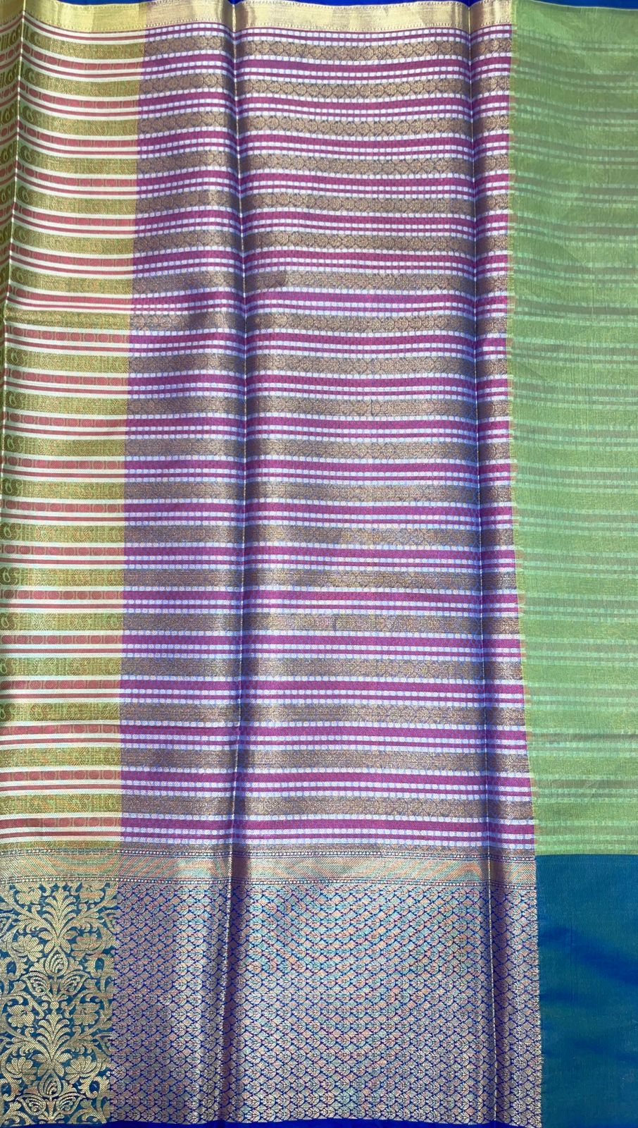 Faishana Presents Green Zari Strip Kanchi Silk Tanchoi Brocade Contrast Torqouise Blue Skirt Border Banarasi Saree