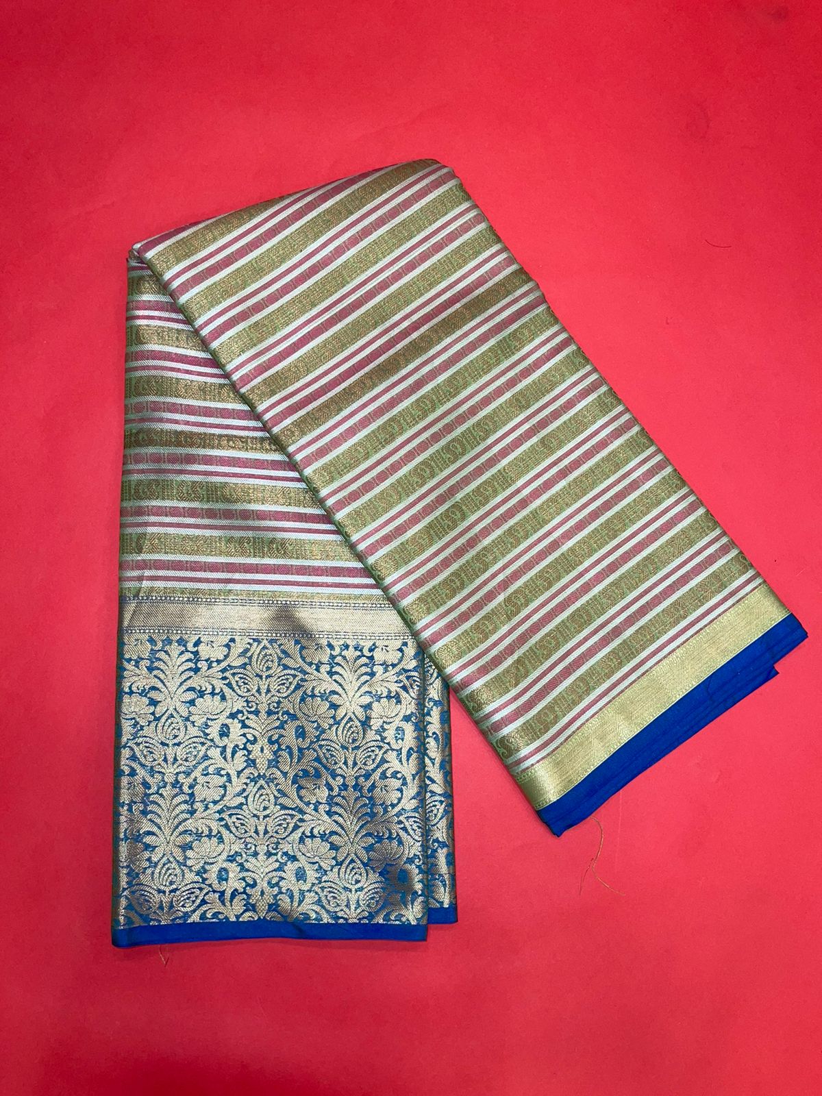 Faishana Presents Green Zari Strip Kanchi Silk Tanchoi Brocade Contrast Torqouise Blue Skirt Border Banarasi Saree