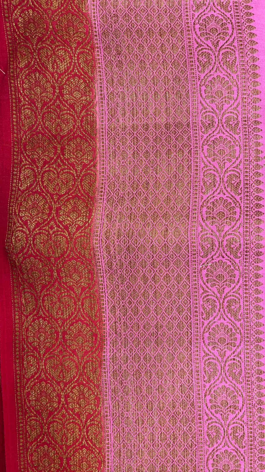 Radiant Elegance: Faishana Pure Silk Handloom Pink Muga Silk Saree with Zari Mina Floral Booti and Contrasting Red Anchal Copper Zari Border and Paired with a Red Blouse