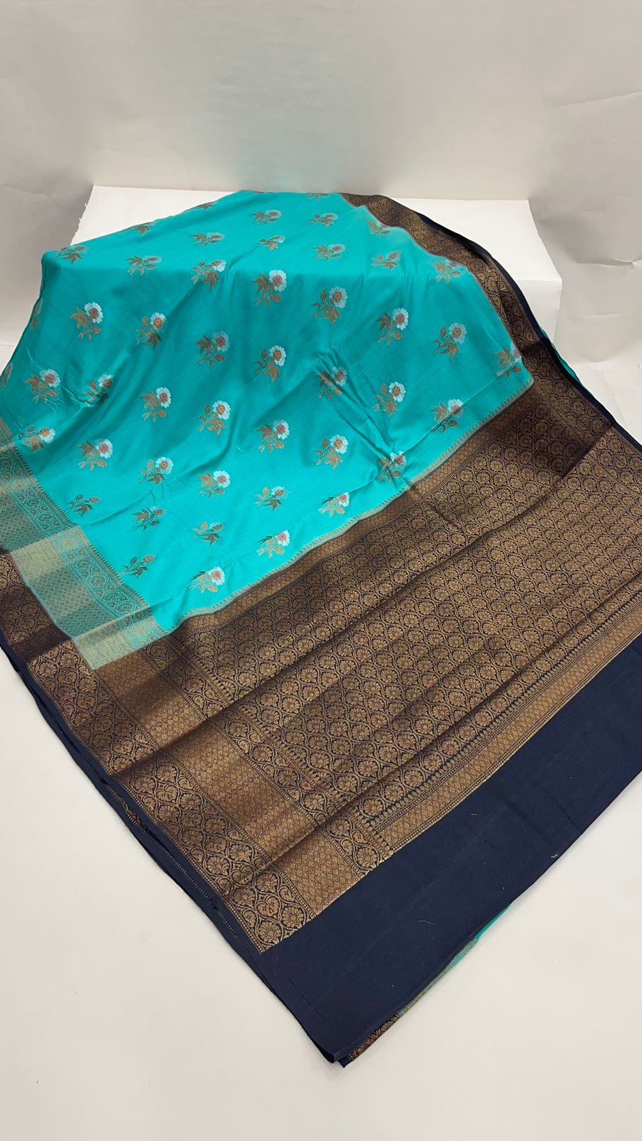 Faishana Pure Silk Handloom Sea Green Muga Silk Zari Mina Floral Booti Contrast Navy Blue Anchal Copper Zari Border Banarasi Saree with Navy Blouse