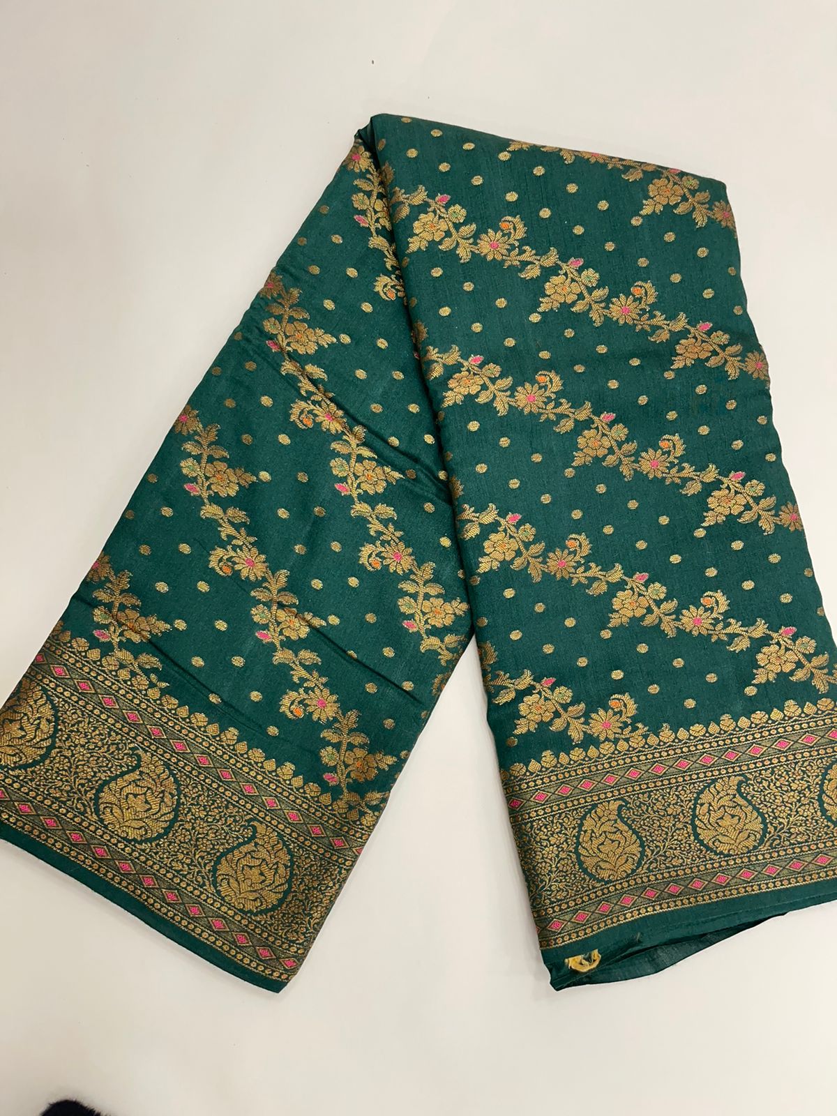 Faishana Presents Pure Silk Handloom Dark Green Muga Silk with Copper Zari Paisley Border and Dark Green Blouse