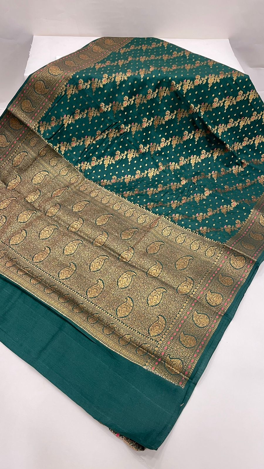 Faishana Presents Pure Silk Handloom Dark Green Muga Silk with Copper Zari Paisley Border and Dark Green Blouse