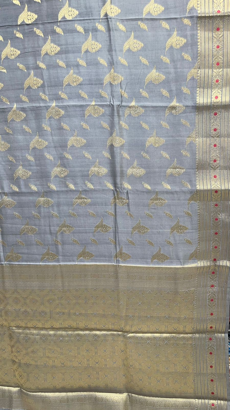 Exquisite Elegance: Faishana's Pure Silk Handloom Grey Chiniya Silk with Gold Zari Floral Booti & Grey Blouse