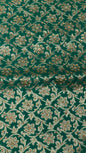 Faishana Presents a Green Satin Silk Stone Work Golden Zari Floral Jaal with Lehariya Jaal Pallu Zari Border Banarasi Saree and Green Blouse