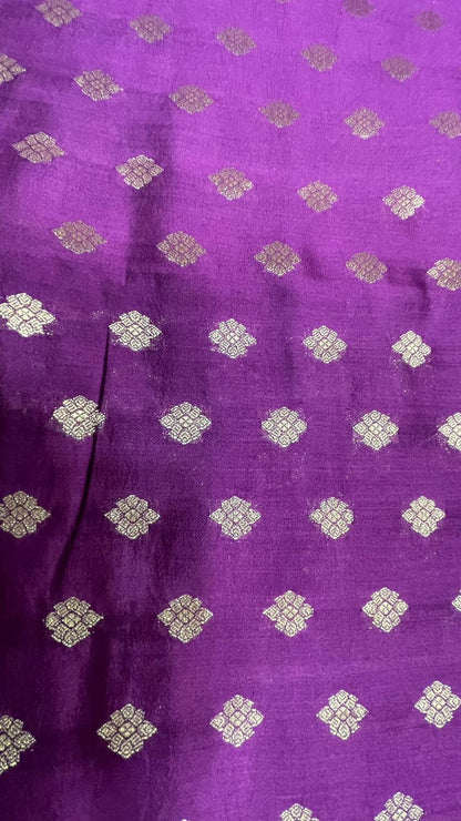 Regal Elegance: Faishana's Pure Silk Handloom Purple Chiniya Silk with Gold Zari Booti Tilfi Anchal and Tilfi Zari Border Paired with Exquisite Purple Blouse Piece