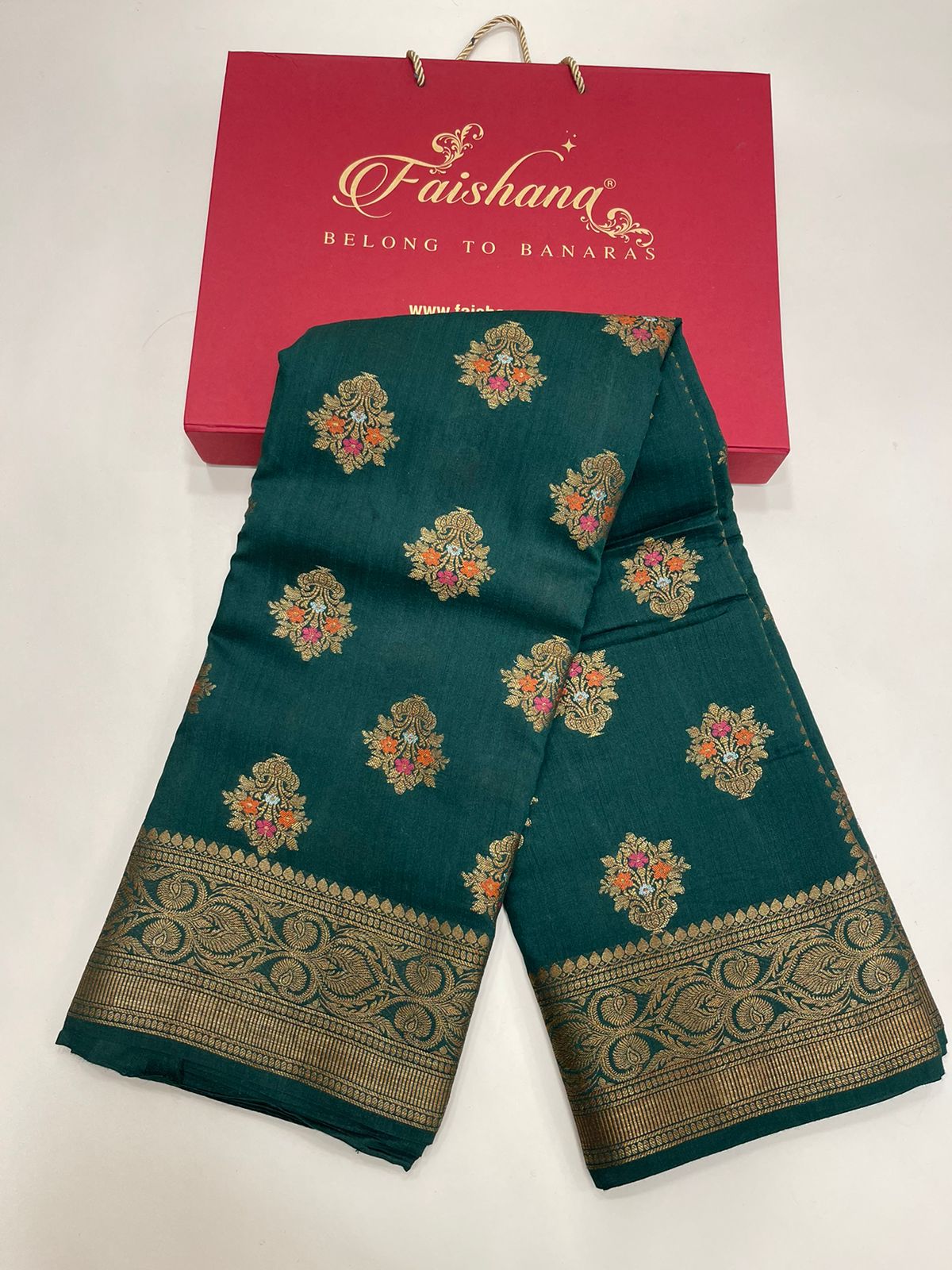 Emerald Elegance: Faishana Pure Silk Handloom Dark Green Munga Silk Minakari Zari Boota Banarasi Saree paired with Dark Green Blouse