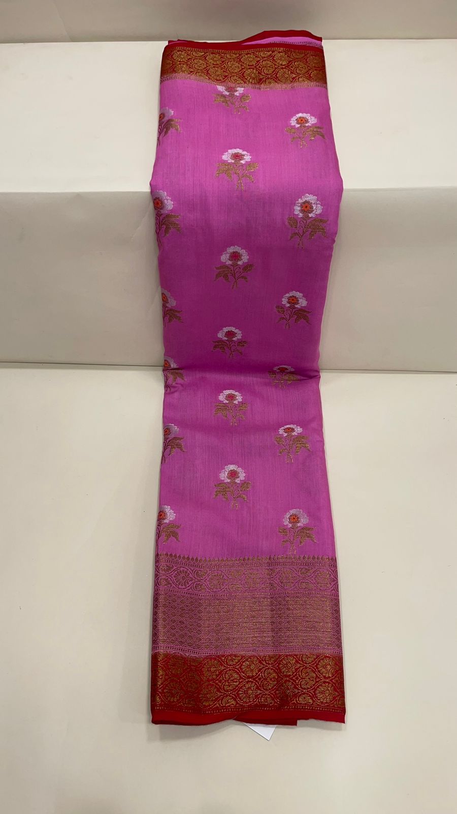 Radiant Elegance: Faishana Pure Silk Handloom Pink Muga Silk Saree with Zari Mina Floral Booti and Contrasting Red Anchal Copper Zari Border and Paired with a Red Blouse