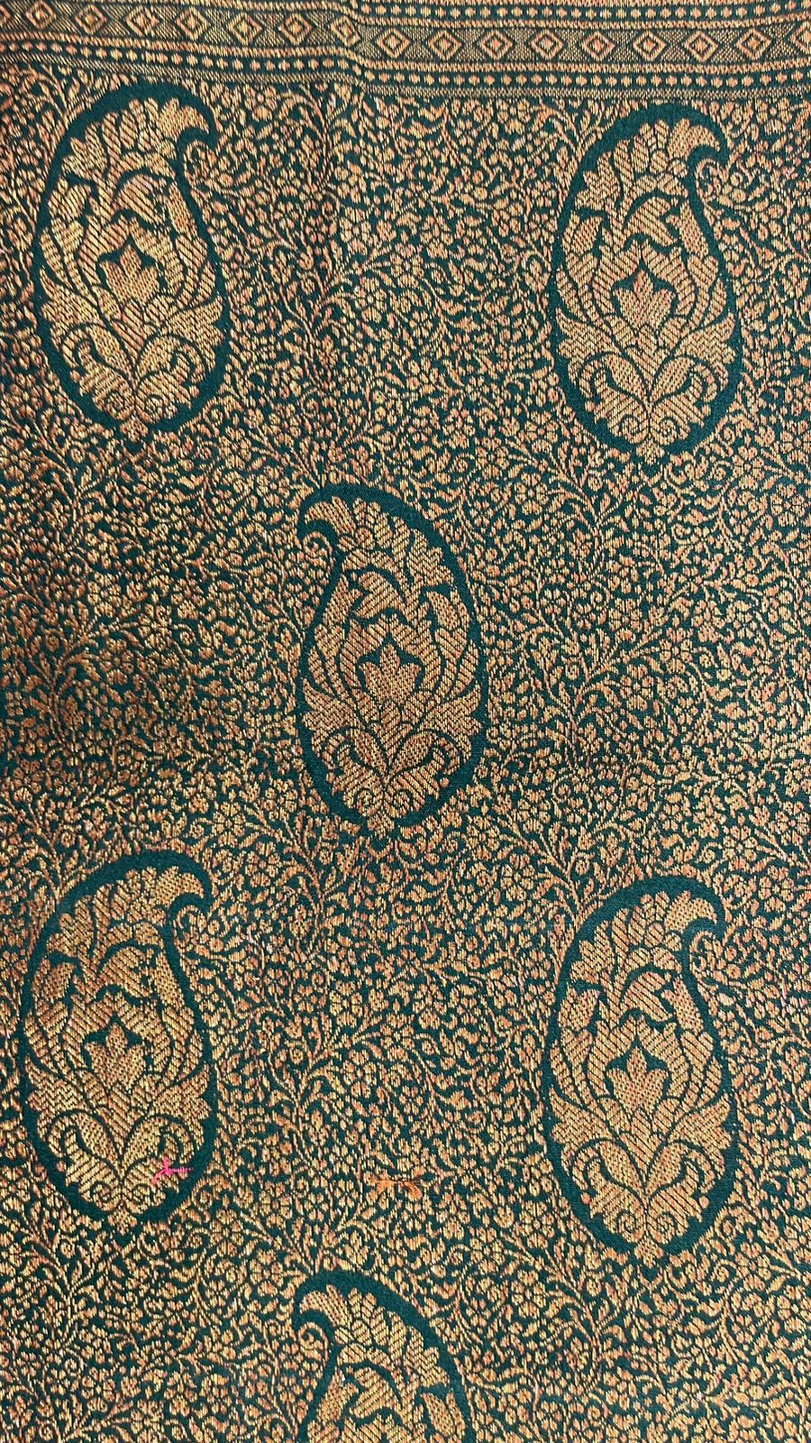 Faishana Presents Pure Silk Handloom Dark Green Muga Silk with Copper Zari Paisley Border and Dark Green Blouse