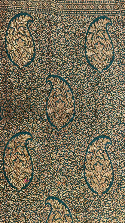 Faishana Presents Pure Silk Handloom Dark Green Muga Silk with Copper Zari Paisley Border and Dark Green Blouse