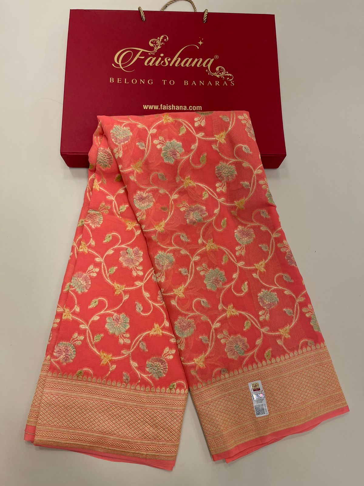 Radiant Threads: Faishana's Pure Silk Handloom Orange Khaddi Georgette Hand Brush Floral Zari Kadhwa Jaal with Banarasi Zari Border with an Orange Blouse