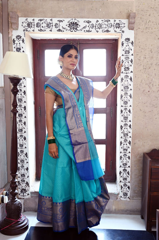Faishana Presents Turquoise Blue Resham Brocade Contrast Blue Zari Pattu Border Banarasi Saree