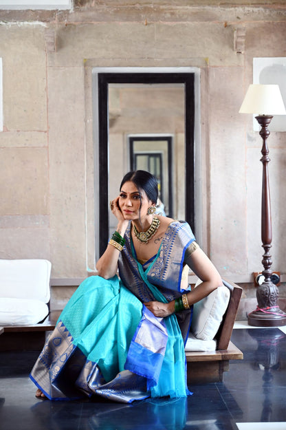 Faishana Presents Turquoise Blue Resham Brocade Contrast Blue Zari Pattu Border Banarasi Saree