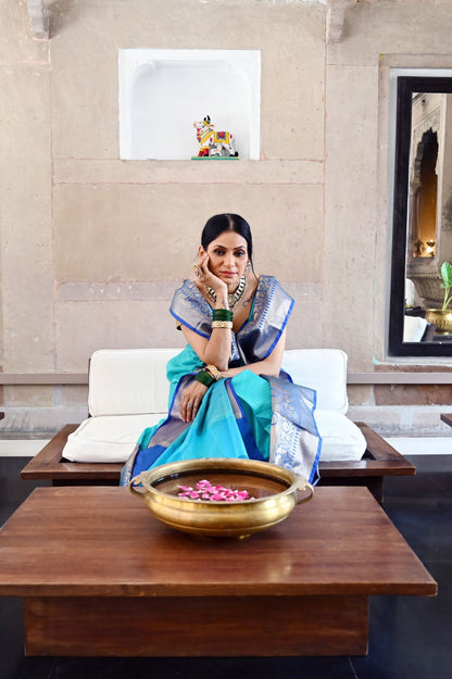 Faishana Presents Turquoise Blue Resham Brocade Contrast Blue Zari Pattu Border Banarasi Saree