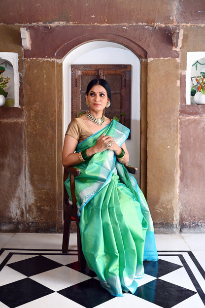 Faishana Presents Green Resham Brocade Contrast Turquoise Blue Zari Pattu Border Banarasi Saree