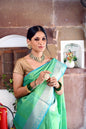 Faishana Presents Green Resham Brocade Contrast Turquoise Blue Zari Pattu Border Banarasi Saree
