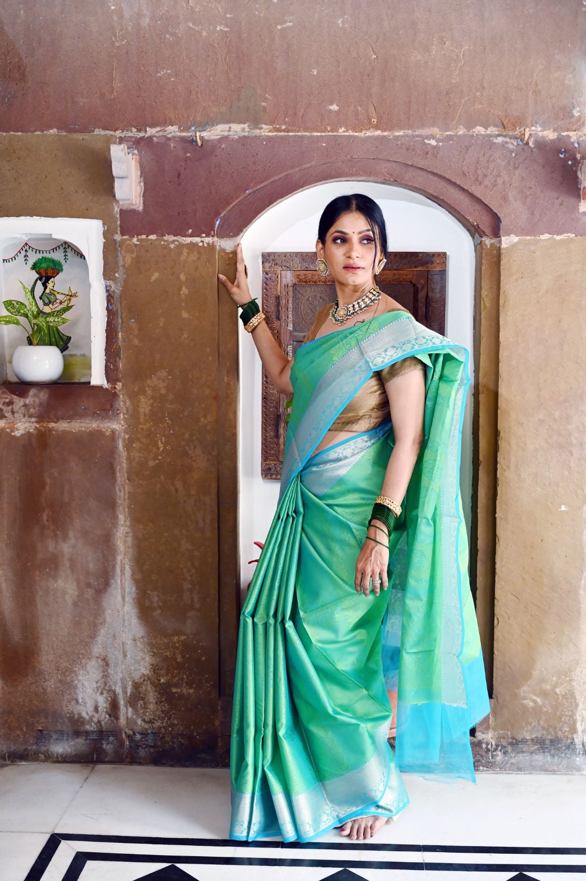 Faishana Presents Green Resham Brocade Contrast Turquoise Blue Zari Pattu Border Banarasi Saree