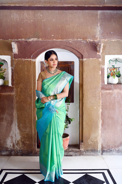Faishana Presents Green Resham Brocade Contrast Turquoise Blue Zari Pattu Border Banarasi Saree