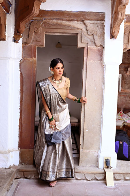 Faishana Presents Silver Zari Kanchi Silk Brocade Contrast Silver Jamawar Border Banarasi Saree