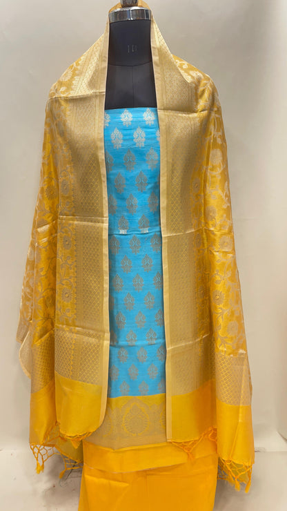 Faishana Presents Blue Semi Katan Silk Floral Zari Booti 3 pcs Suit Set with Contrast Gold Plain Bottom and Tilfi Jaal Gold Dupatta ASD_122