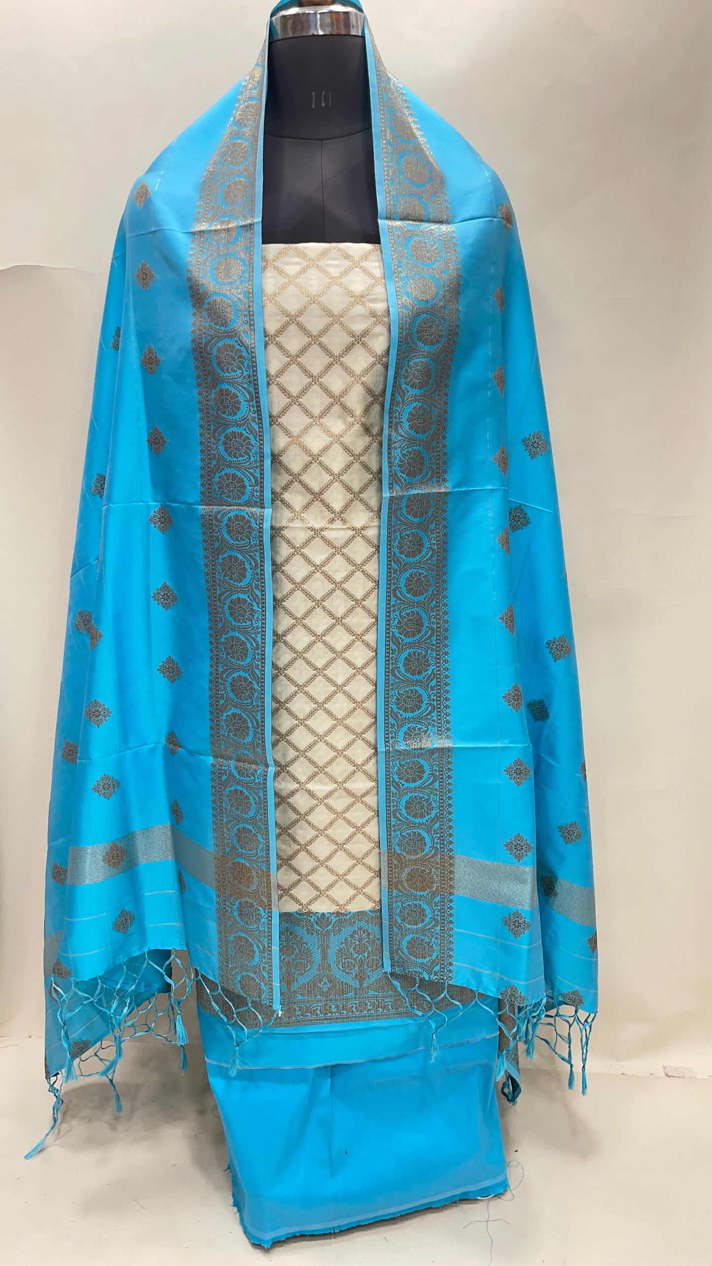 Faishana Presents Off white Semi Katan Silk Checkered Striped 3 pcs Suit Set with Contrast Blue Plain Bottom and Floral Zari Booti Blue Dupatta ASD_126