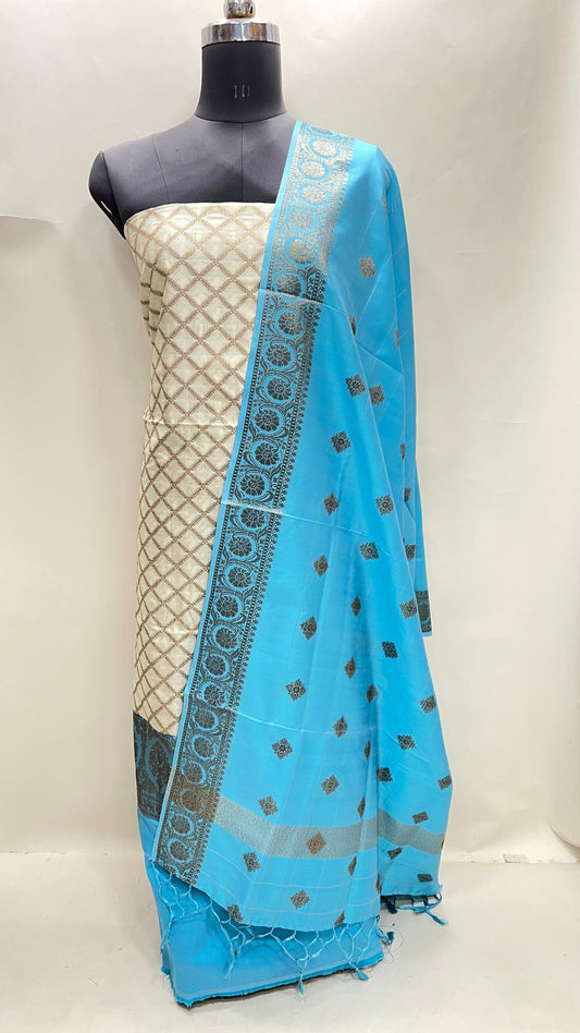 Faishana Presents Off white Semi Katan Silk Checkered Striped 3 pcs Suit Set with Contrast Blue Plain Bottom and Floral Zari Booti Blue Dupatta ASD_126