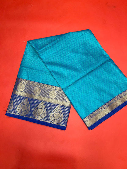 Faishana Turquoise Blue Resham Brocade Saree With Contrast Blue Zari Pattu Border