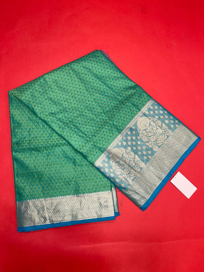 Faishana Green Resham Brocade Saree With Contrast Turquoise Blue Zari Pattu Border