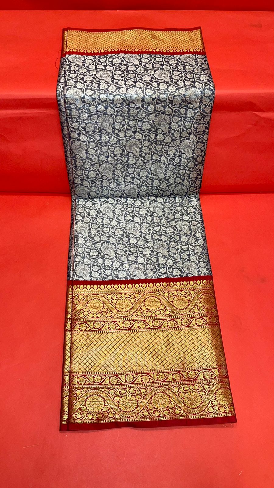 Faishana Presents Navy Blue Zari Patola Contrast Zari Brocade Maroon Pattu Border Banarasi Saree