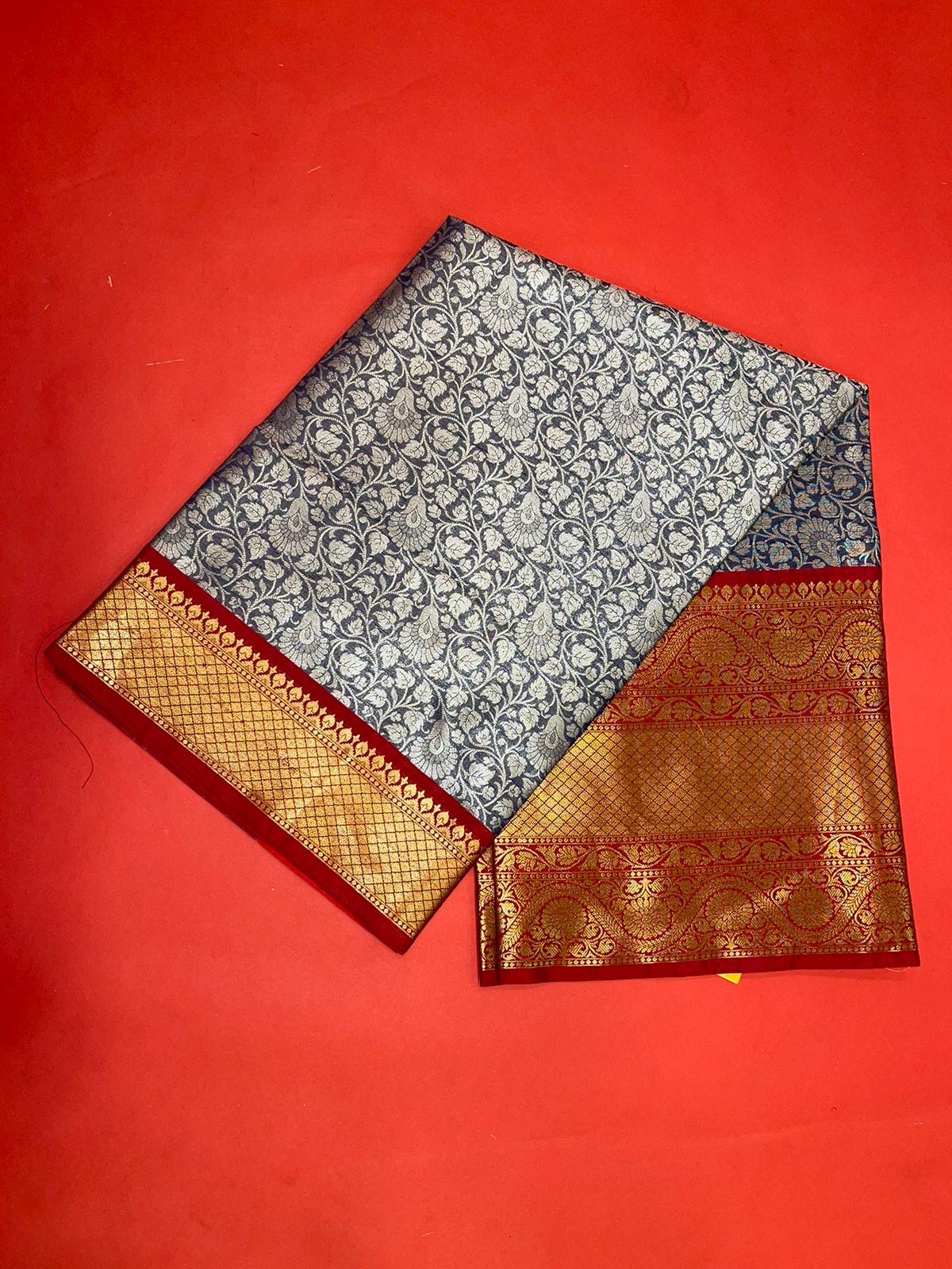Faishana Presents Navy Blue Zari Patola Contrast Zari Brocade Maroon Pattu Border Banarasi Saree