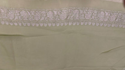 Faishana Pure Silk Handloom Light Green Khaddi Georgette Kadhwa Meena Silver Booti Saree with Banarasi Silver Zari Border Saree