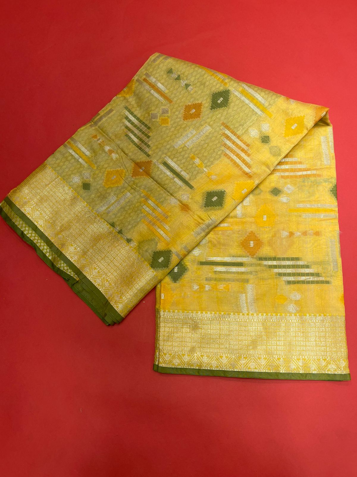 Faishana Presents Handwoven Gold Mulberry Silk Geometrical Motif Tilfi Zari Border With Orange Blouse Banarasi Saree