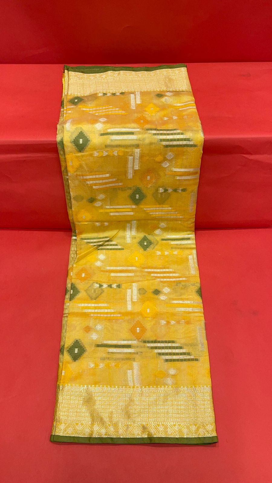 Faishana Presents Handwoven Gold Mulberry Silk Geometrical Motif Tilfi Zari Border With Orange Blouse Banarasi Saree