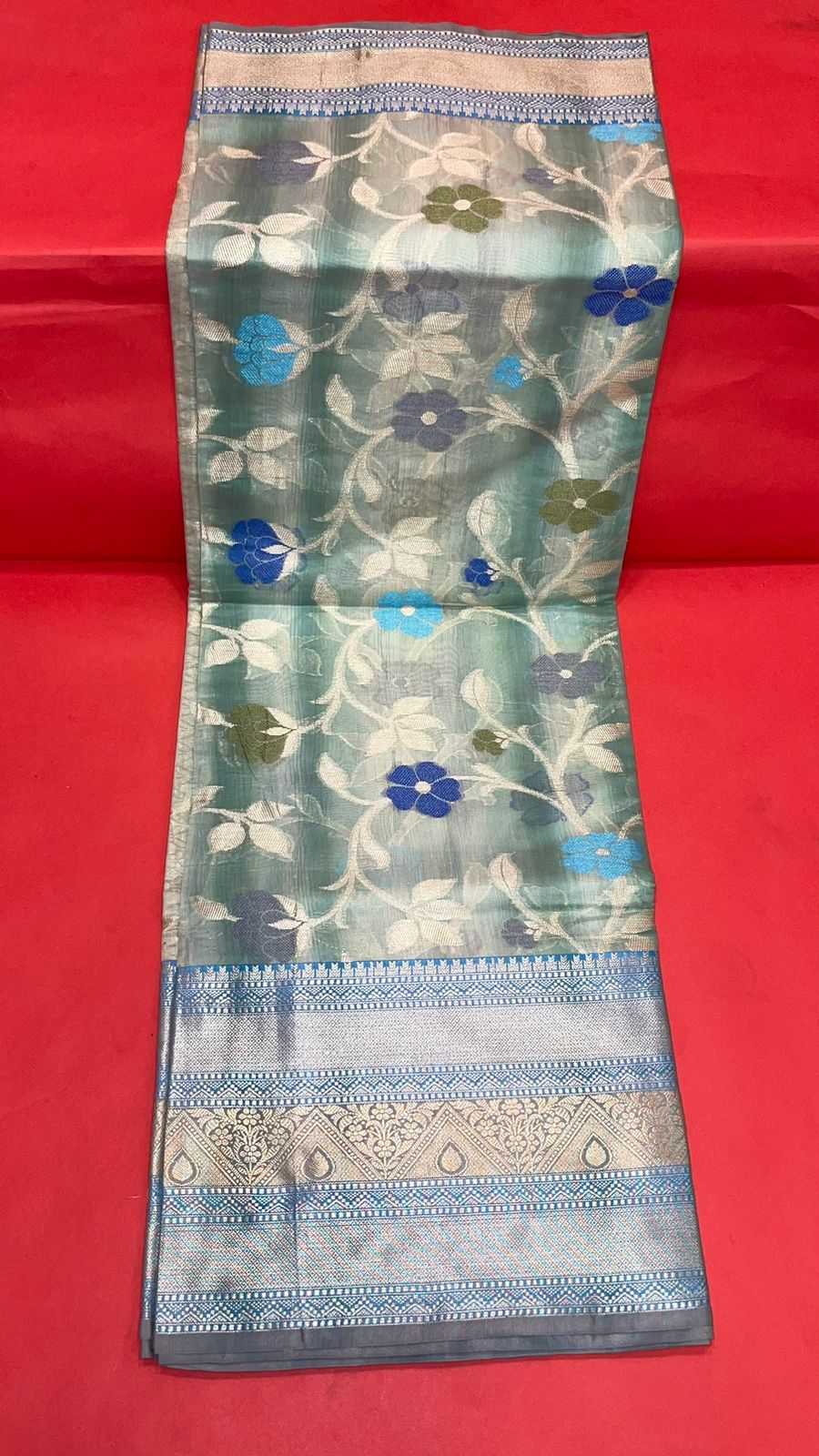 Faishana Presents Handwoven Turquoise Blue Matka Silk Tilfi Jaal Skirt Border With Grey Blouse Banarasi Saree