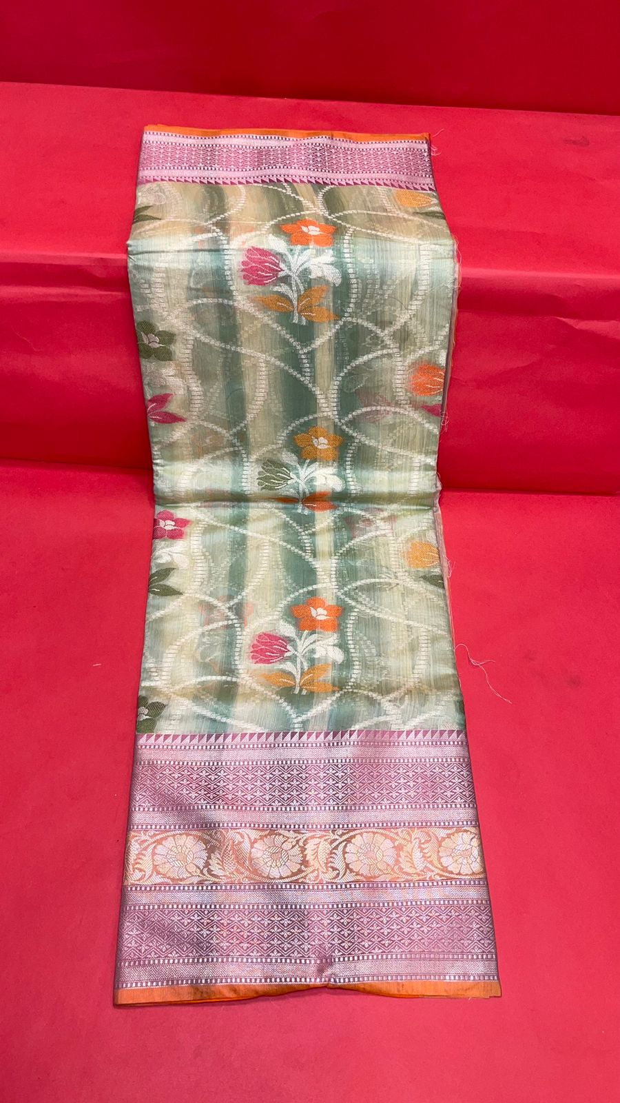 Faishana Presents Handwoven Seagreen Matka Silk Alfi Jaal Skirt Border With Orange Blouse Banarasi Saree