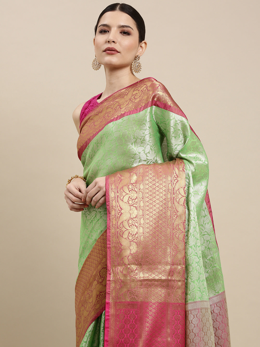 Faishana Presents Presents Green Kanchi Silk Zari Brocade Contrast Zari Brocade Red Pattu Border Banarasi Saree.